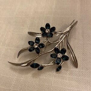 Beautiful SilverTone Floral Brooch with Dark Blue Stones